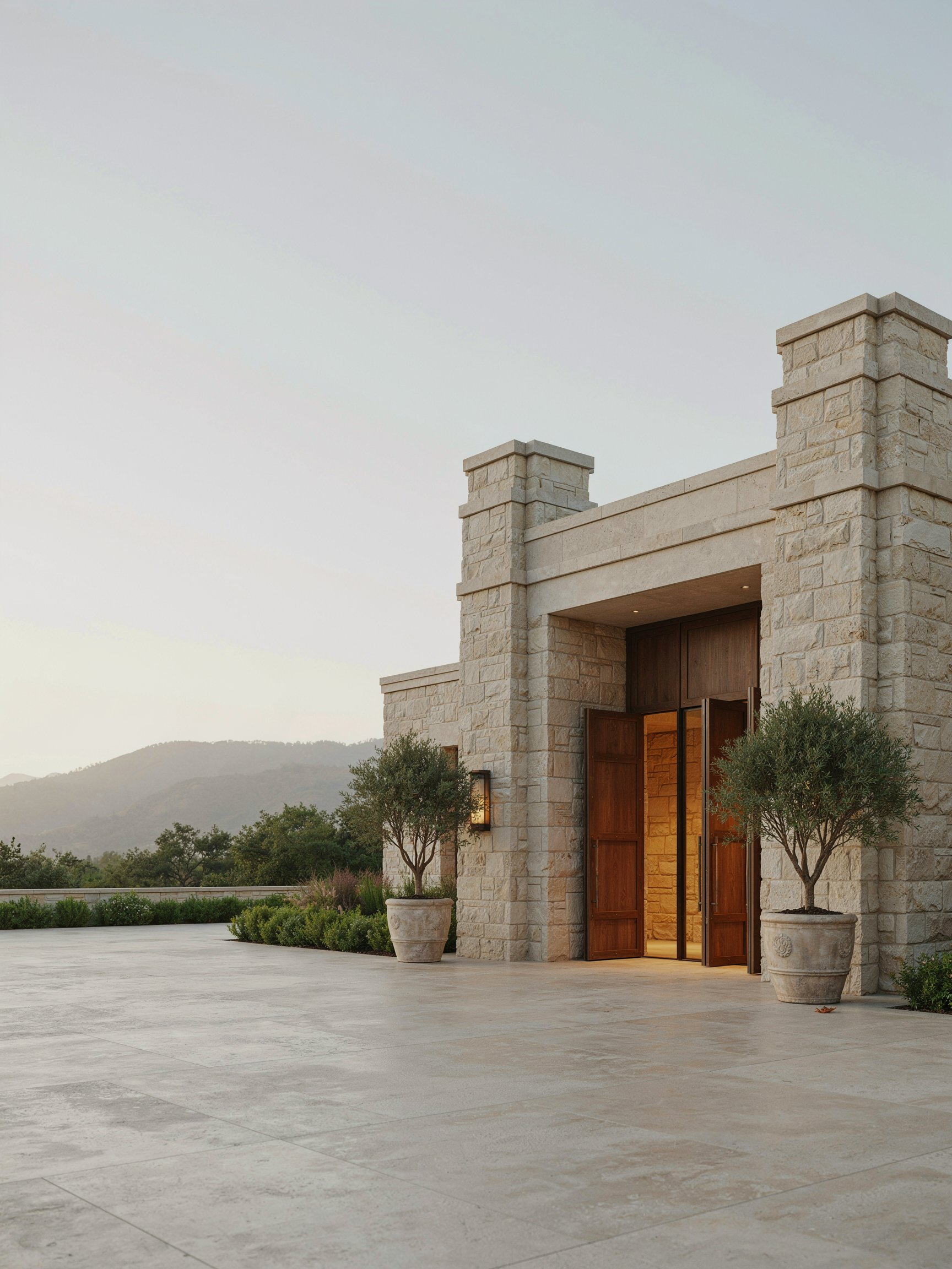 Entry portico of an independent luxury property at dusk